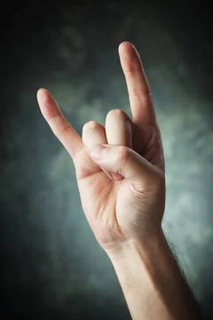 Das Zeichen der Hörner A Hand making a Sign of the horns aka devil sign ak.. Stock Photos