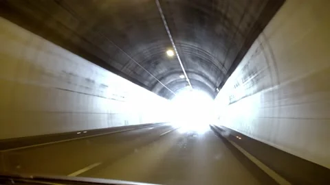 Dash Cam Driving Through Road Tunnel in Alps, Italy Europe Stock Footage 220551531