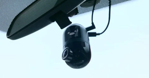 A dash cam installed inside car with rotating smart camera, close up 스톡 동영상 305534617