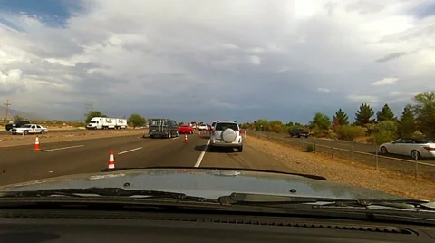 Dash cam traffic jam on I-10 accident scene trucks slow moving Stock Footage 39947230