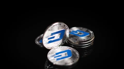 Dash crypto coins and black background Stock Footage 124908029