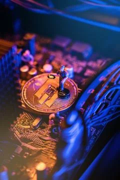 Dash Cryptocurrency coin on a PC computer motherboard, crypto currency mining Stockfoto's