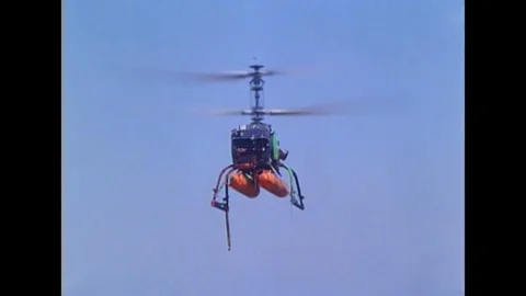 DASH Helicopter in flight with two torpedoes, 1966 Stock Footage 117053169