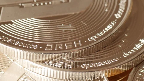 Dash silver cryptocurrency coin rotating, macro Stock Footage 88424627