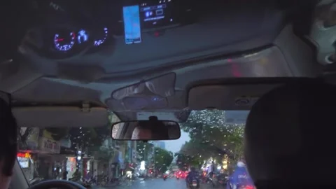 Dashboard and glowing smartphone screen are reflected in suspended ceiling Stock Footage 330861043