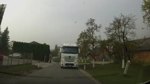 Dashboard camera view of driving a car on narrow countryside road Stock Footage 171180057