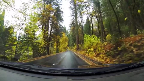 Dashboard camera view driving through yosemite valley during autumn season .. Stock Footage 337403967