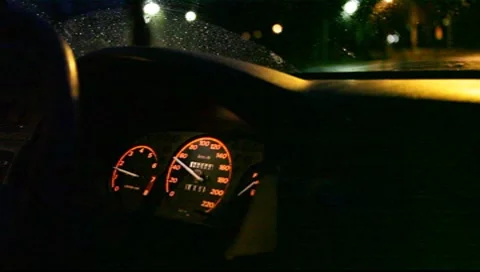 Dashboard of a car driving through the night Stock Footage 8575850