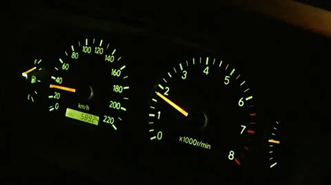 The dashboard of a car in motion at night Stock Footage 20513576
