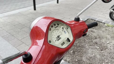 Dashboard control panel of a red motor scooter. Close-up Stock Footage 203858182
