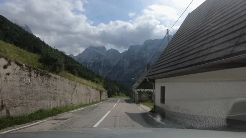 Dashboard dash cam point of view POV driving on curved countryside road Stock Footage 138590396