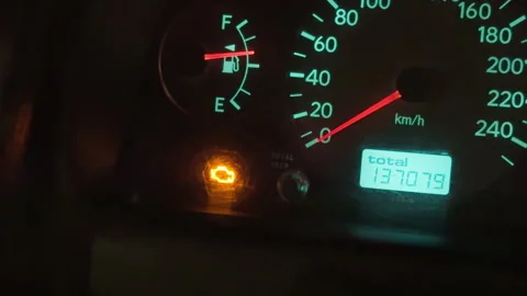 Dashboard displaying engine alert. Close view of dashboard indicating engine Stock Footage 328378308