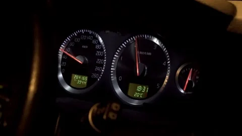 Dashboard Of Moving Car At Night Shows Speedometer, Temperature, Time, Fuel Stock Footage 250200341