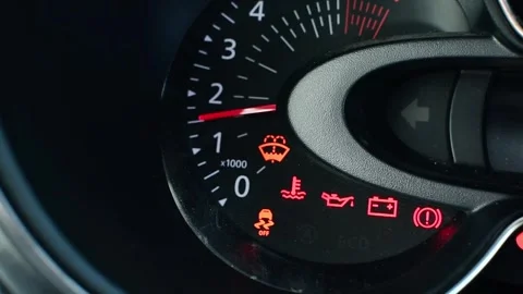 Dashboard with odometer arrow that rises when the vehicle engine is started.. Stock Footage 287297274