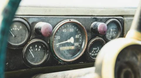The dashboard in an old car close-up. Speedometer and gauges Stock Photos
