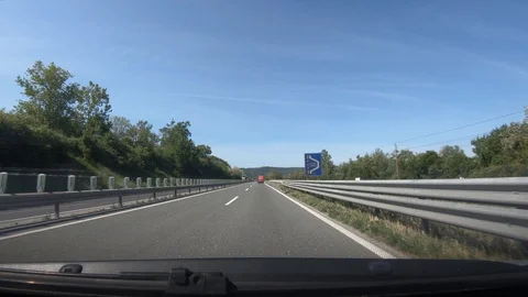 Dashboard point of view POV, driving on Slovenia highway towards Koper Stock Footage 130071029