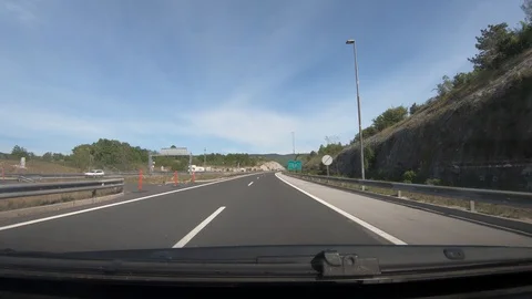 Dashboard point of view POV, driving on Slovenia highway Stock Footage 130075934