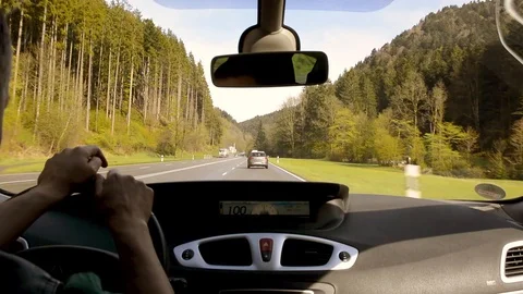 Dashboard View Driving through Dense Forest European Landscape Highway Stock Footage 94985046