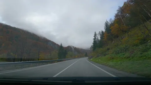 Dashcam camera driving POV point of view driving on countryside road in Slovenia Stock Footage 143589831