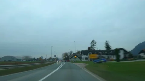 Dashcam camera POV point of view driving on road in Kranj, Slovenia Stock Footage 143693910