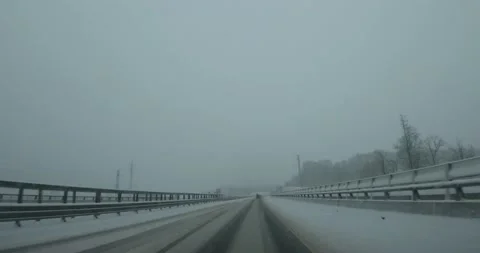 Dashcam dash camera POV driving on plowed highway road in Slovenia Stock Footage 145977596