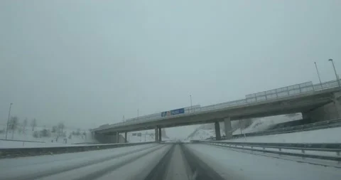 Dashcam dash camera POV driving on plowed highway road in Slovenia Stock Footage 145977606