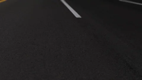 Dashed White Lines on a Road Stock Footage 77604071