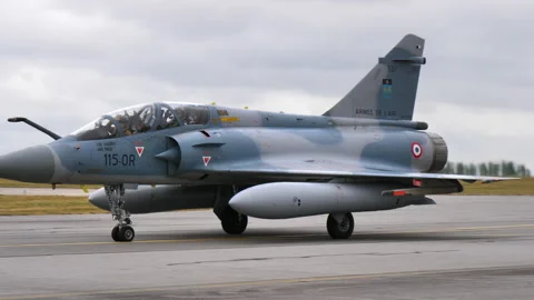 Dassault Mirage 2000B operational conversion trainer taxiing on the runway Stock Footage 153663068