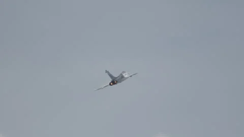 Dassault Rafale fighter jet preforming high speed manoeuvres showing its Stock Footage 246133607