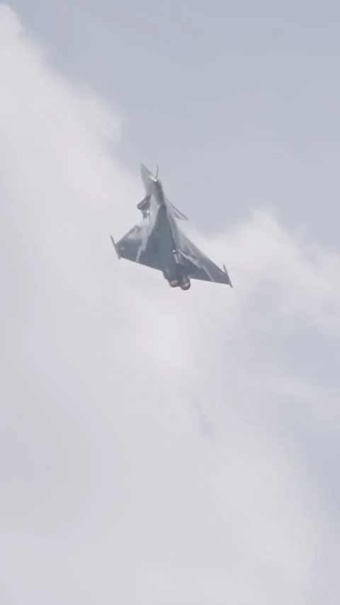 Dassault Rafale fighter jet preforming high speed maneuvers Stock Footage 320318950