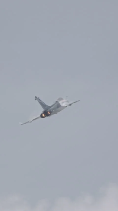 Dassault Rafale fighter jet preforming high speed maneuvers Stock Footage 320318956