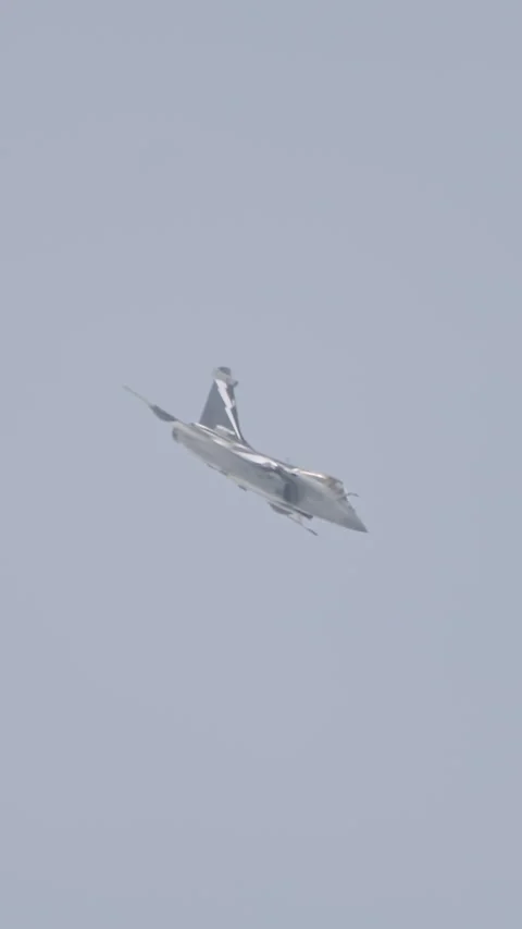 Dassault Rafale fighter jet preforming high speed maneuvers Stock Footage 320318957