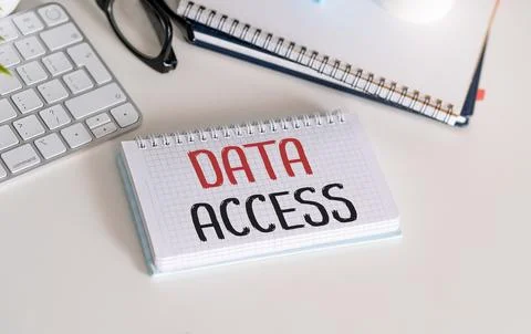 Data Access - text on a notepad and keyboard. Concept of pass or permission.. Stock Photos