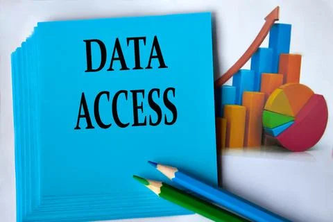 DATA ACCESS - words on a blue sheet of paper with pencils on the background.. Stock Photos