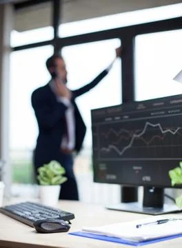 Data analysis displayed on marketing specialist computer in his office Stock Photos