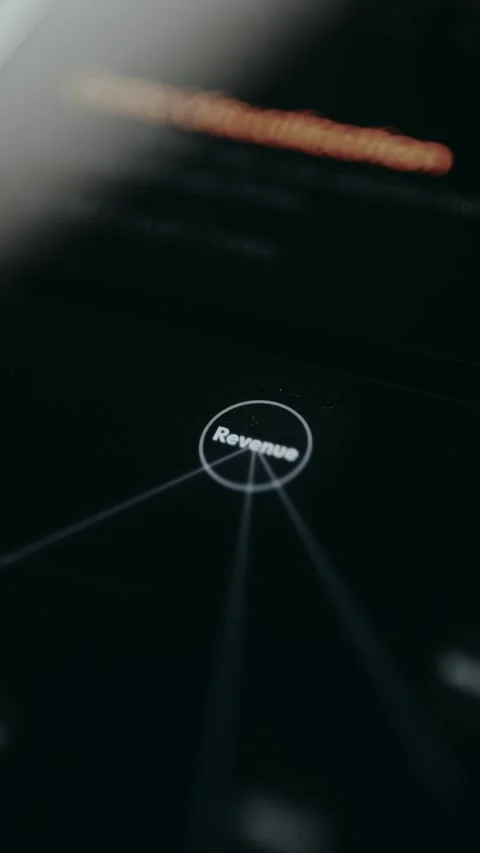 Data Analysis. Person taps a Node called Revenue, connection lights up Stock Footage 331593989
