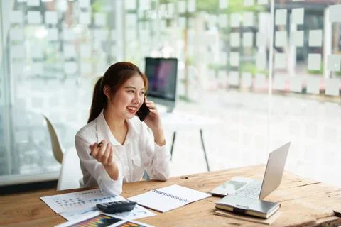 Data analysis, plan, marketing, accounting, audit, asian business woman holding Stock Photos