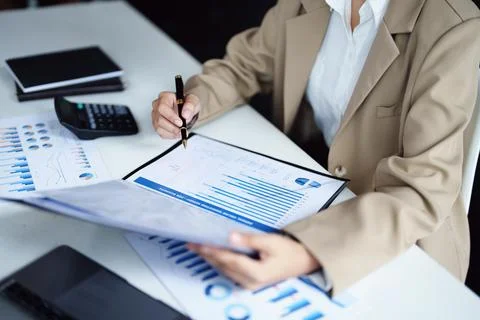 Data analysis, plan, marketing, accounting, audit, asian business woman planning Stock Photos