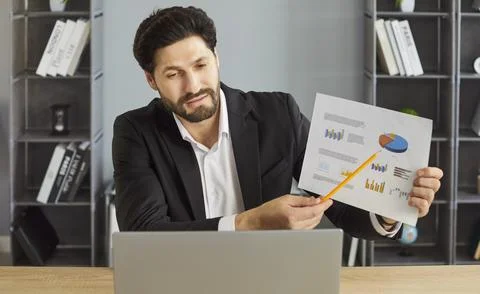 Data analysis presentation of confident businessman during video call to partner Stock Photos