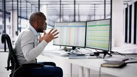Data Analyst African Man Using Spreadsheet Stock Footage 262103316