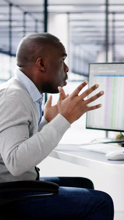 Data Analyst African Man Using Spreadsheet Stock Footage 262106125