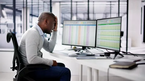 Data Analyst African Man Using Spreadsheet Stock Footage 262880032