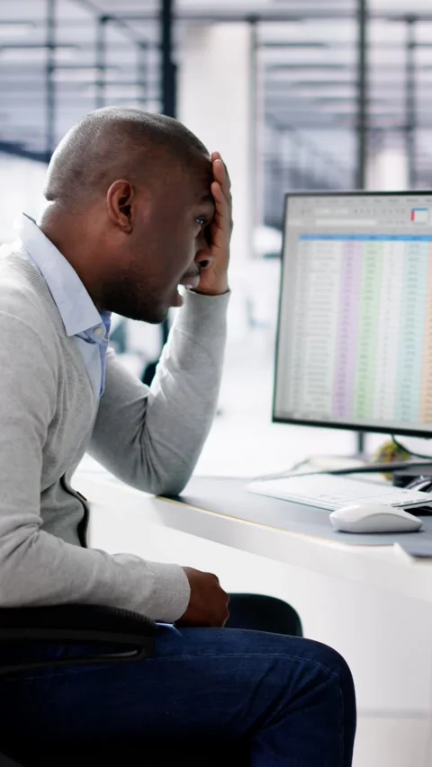 Data Analyst African Man Using Spreadsheet Stock Footage 262885363