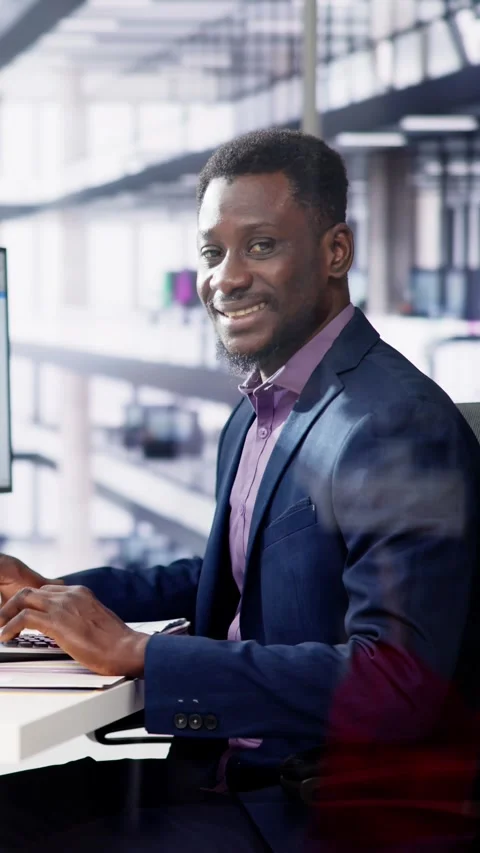 Data Analyst African Man Using Spreadsheet Stock Footage 263494799