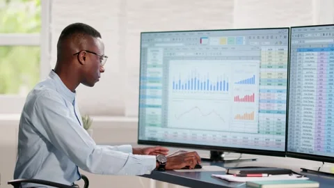 Data Analyst African Man Using Spreadsheet Stock Footage 275505171