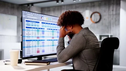 Data Analyst African Man Using Spreadsheet Stock Footage 288555794