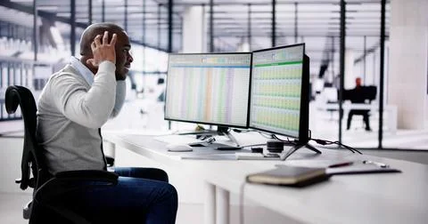 Data Analyst African Man Using Spreadsheet Stock Photos