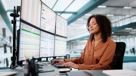 Data Analyst African Woman Using Spreadsheet Stock Footage 303671332