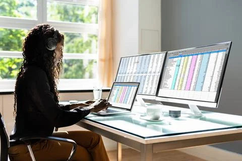 Data Analyst African Woman Using Spreadsheet Stock Photos