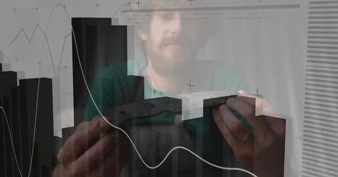 Data analyst aligning 3D bar blocks in workspace, with line graph, grid lines Stockfoto's